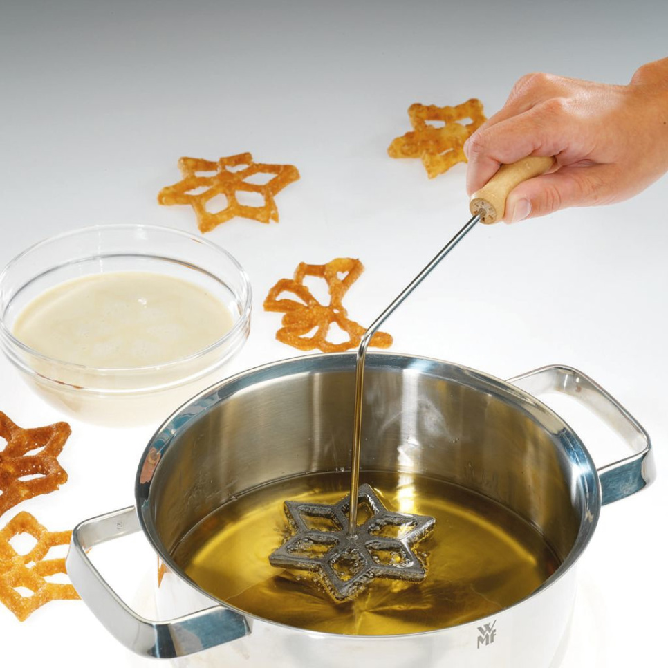 Strudsejern med tre figurer - Westmark